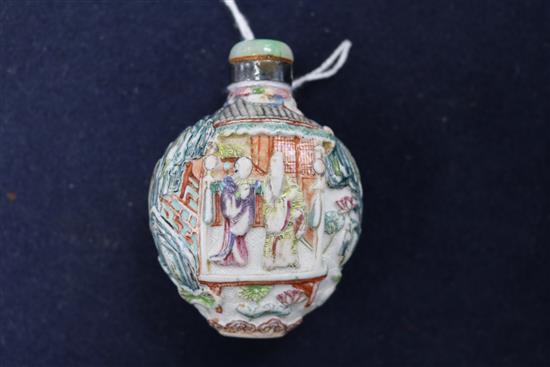 A Chinese moulded famille rose snuff bottle, Jiaqing mark period